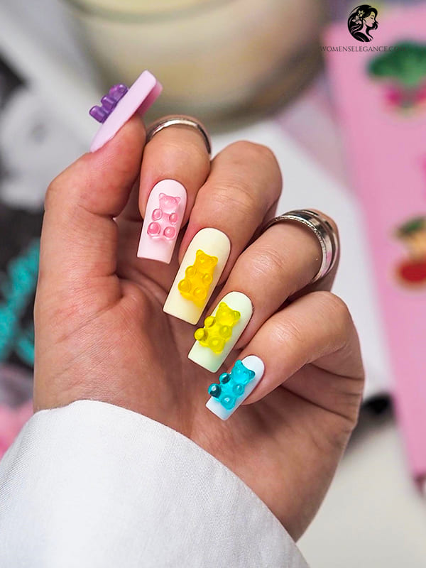 White Base Nails with Floating Gummy Bear Designs